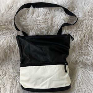 Vans black and white adjustable tote backpack.